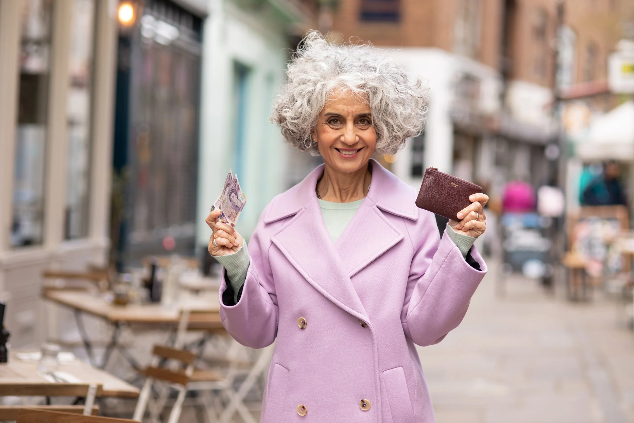 Woman holding money